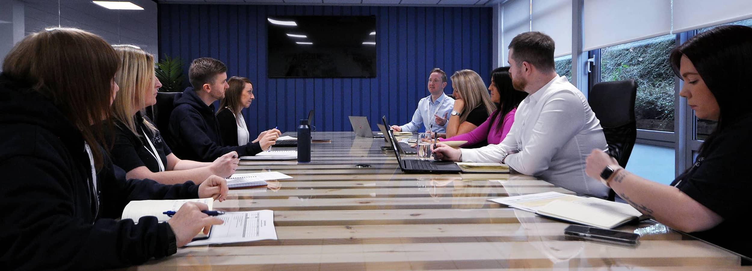 boardroom meeting with team in discussion